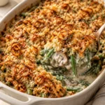 Green bean casserole with creamy mushroom sauce and crispy shallot Parmesan topping